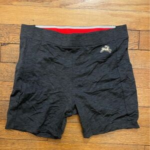 Tracksmith twilight shorts with zipper pocket on side